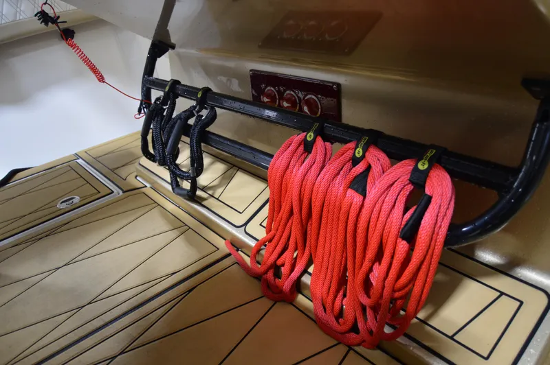 Slide: The Image of Red and black ropes on a 2017 Statement 380 Open boat deck. - 40