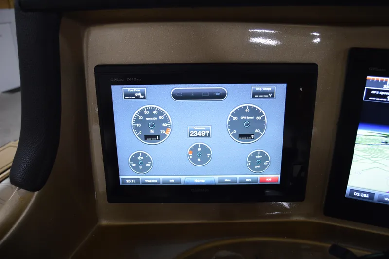Slide: The Image of Dashboard display of a 2017 Statement 380 Open boat showing gauges and controls. - 45