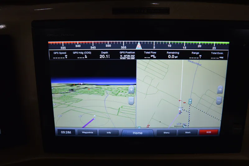 Slide: The Image of Boat navigation display showing GPS data and map on a 2017 Statement 380 Open. - 46
