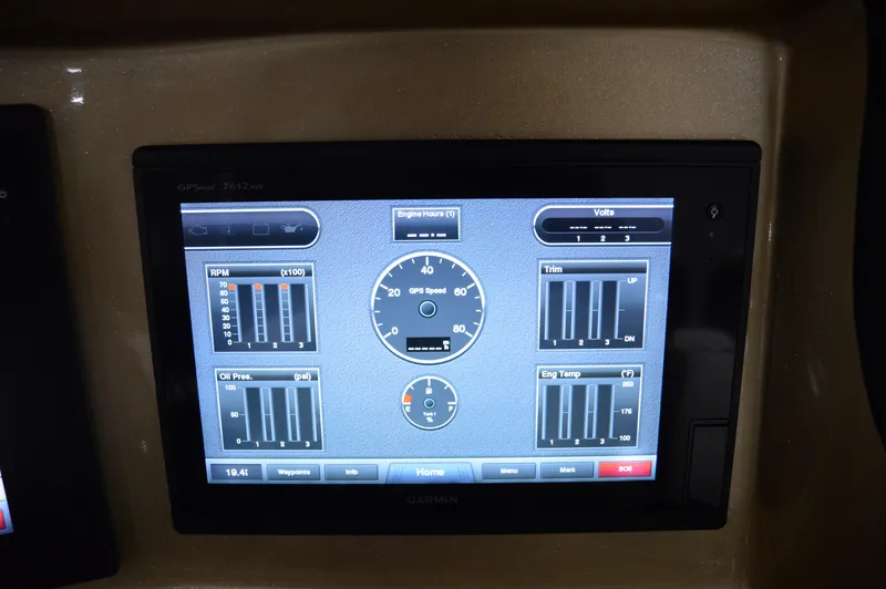 Slide: The Image of Dashboard display of a 2017 Statement 380 Open boat showing engine metrics. - 47