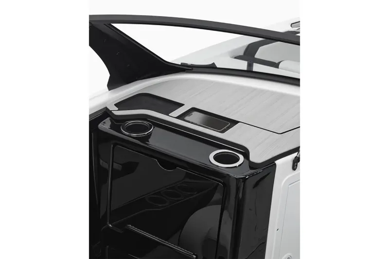Slide: The Image of Interior view of 2025 Yamaha Boats 222SE, featuring sleek dashboard and cup holders. - 35