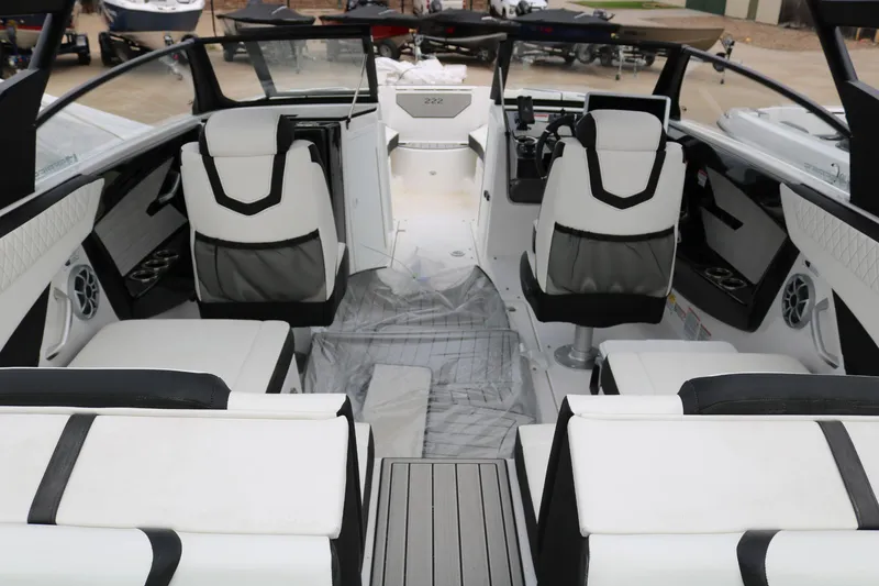 Slide: The Image of 2025 Yamaha Boats 222SE interior with modern seating and sleek design. - 5
