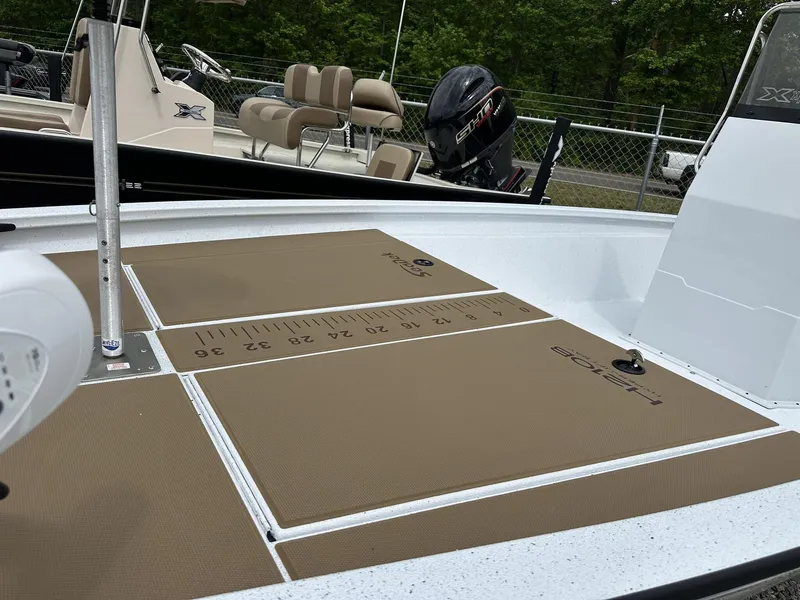 Slide: The Image of 2025 Xpress Hyper-Lift Bay Series 210 BAY-175 HP boat deck with measuring ruler. - 4