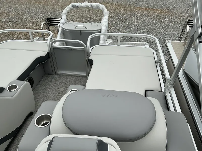 Slide: The Image of 2025 Avalon LSZ 23 Rear Lounger with spacious seating and cup holders on a pontoon boat. - 10