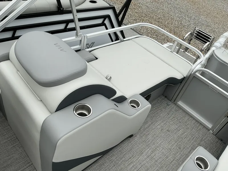 Slide: The Image of 2025 Avalon LSZ 23 Rear Lounger boat interior with sleek seating and cup holders. - 12