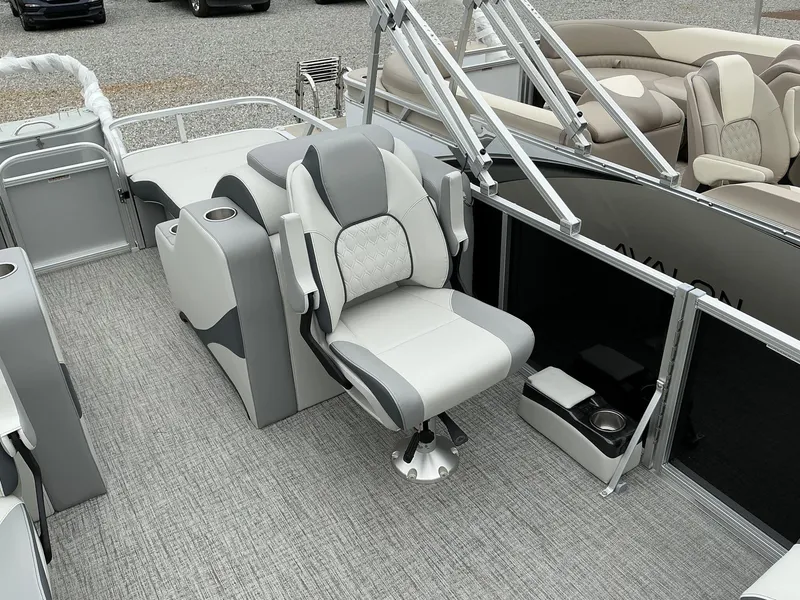 Slide: The Image of 2025 Avalon LSZ 23 Rear Lounger boat interior with luxurious seating and modern design. - 5