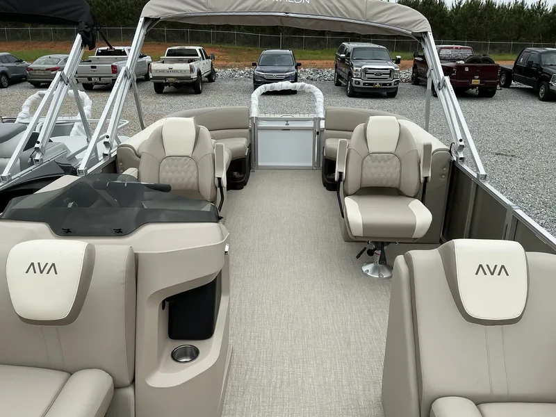 Slide: The Image of 2025 Avalon LSZ 23 Quad Lounger pontoon boat with luxurious seating and modern design. - 11