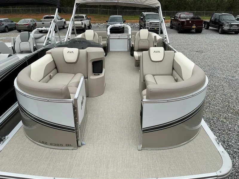 Slide: The Image of 2025 Avalon LSZ 23 Quad Lounger pontoon boat with luxurious seating and modern design. - 15