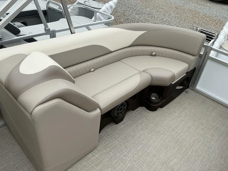 Slide: The Image of 2025 Avalon LSZ 23 Quad Lounger with beige and cream seating, featuring built-in speakers. - 6