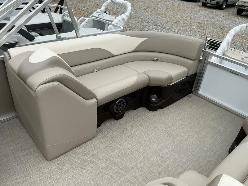 Slide: The Image of 2025 Avalon LSZ 23 Quad Lounger interior with beige seating and modern design. - 9