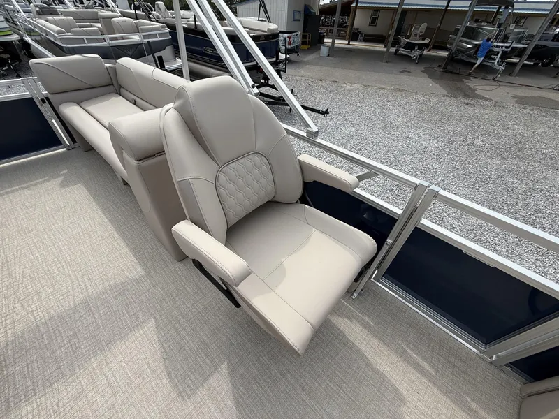 Slide: The Image of 2025 Avalon VENTURE 23 QUAD LOUNGER boat interior with luxurious seating. - 9