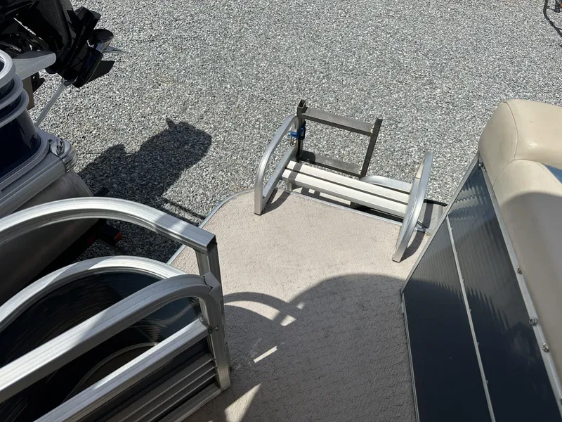 Slide: The Image of 2015 Lowe SS190 boat with aluminum ladder and carpeted deck. - 11