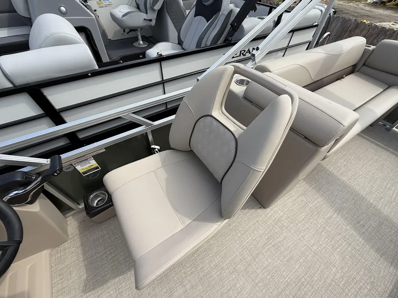 Slide: The Image of Luxurious seating on 2025 Avalon VLS 23 QUAD LOUNGER pontoon boat, featuring elegant design and comfort. - 7