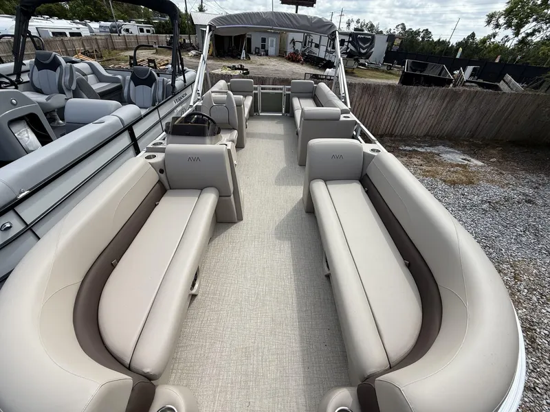 Slide: The Image of 2025 Avalon VLS 23 Quad Lounger pontoon boat with spacious seating and modern design. - 3