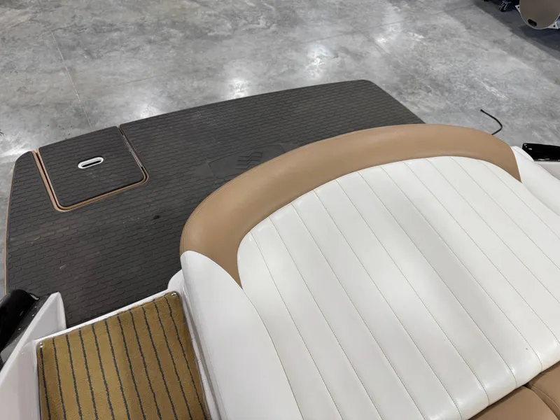 Slide: The Image of 2008 Four Winns SL 262 boat interior with tan and white seating. - 8