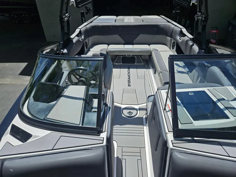 Slide: The Image of 2020 Moomba Max boat interior with sleek seating and modern design. - 13
