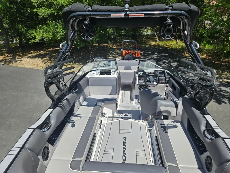 Slide: The Image of 2020 Moomba Max boat interior with sleek seating and advanced dashboard features. - 16