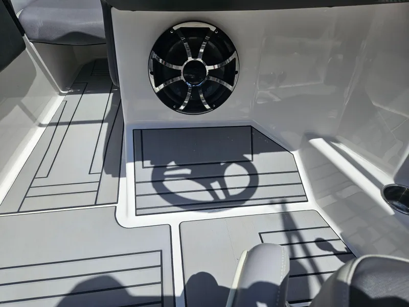 Slide: The Image of 2020 Moomba Max boat interior with speaker and modern flooring design. - 17