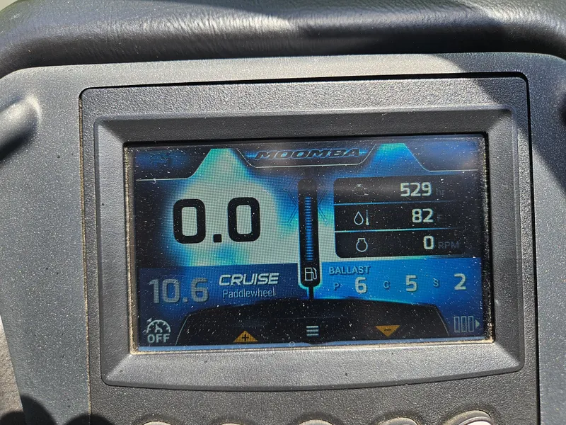 Slide: The Image of Dashboard display of a 2020 Moomba Max boat showing speed, ballast, and engine data. - 24