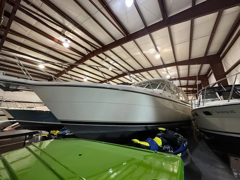 Slide: The Image of 1998 Tiara Yachts 4000 Express in indoor storage facility. - 27