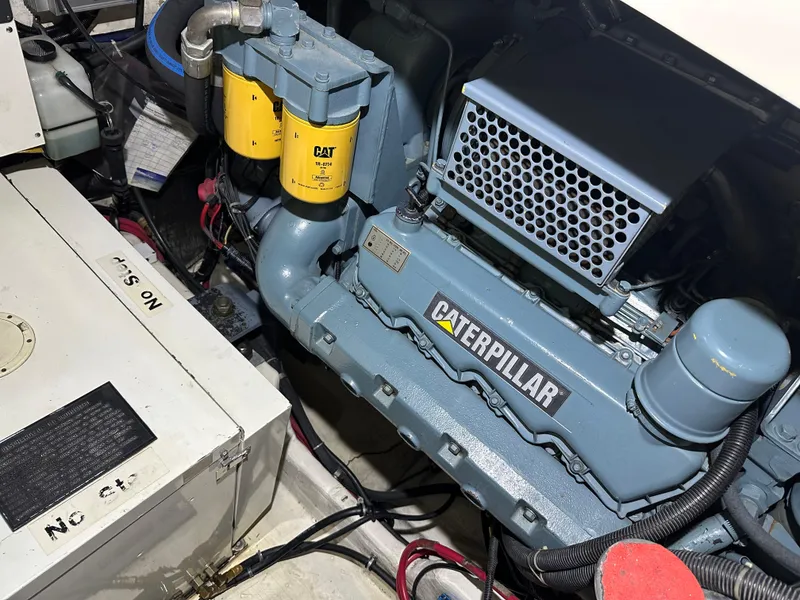 Slide: The Image of Engine room of a 1998 Tiara Yachts 4000 Express with Caterpillar engine. - 33