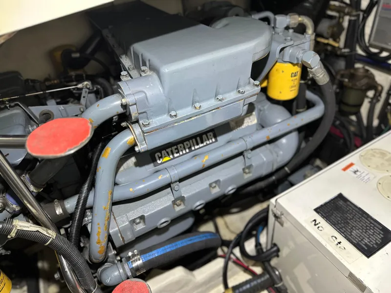 Slide: The Image of Engine compartment of a 1998 Tiara Yachts 4000 Express with Caterpillar engine. - 34