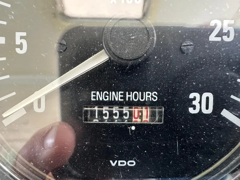 Slide: The Image of Close-up of a Tiara Yachts 4000 Express 1998 engine hour meter showing 1555.01 hours. - 40