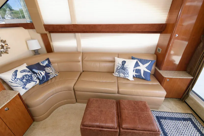 Slide: The Image of Luxurious interior of 2007 Meridian 341 Sedan with leather seating and nautical-themed pillows. - 12