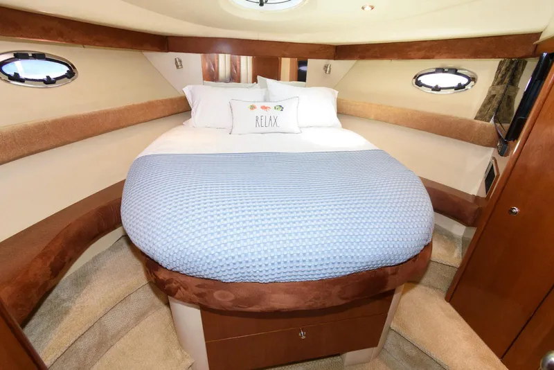 Slide: The Image of Luxurious bedroom in 2007 Meridian 341 Sedan yacht with cozy bedding. - 17