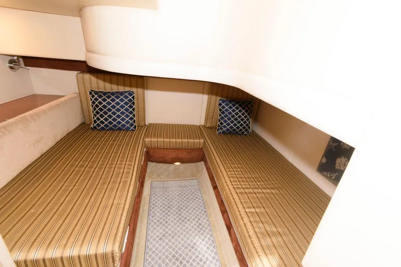 Slide: The Image of 2007 Meridian 341 Sedan interior with twin beds and decorative pillows. - 19