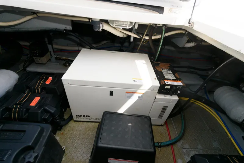Slide: The Image of Engine room of 2007 Meridian 341 Sedan with Kohler generator and battery setup. - 24