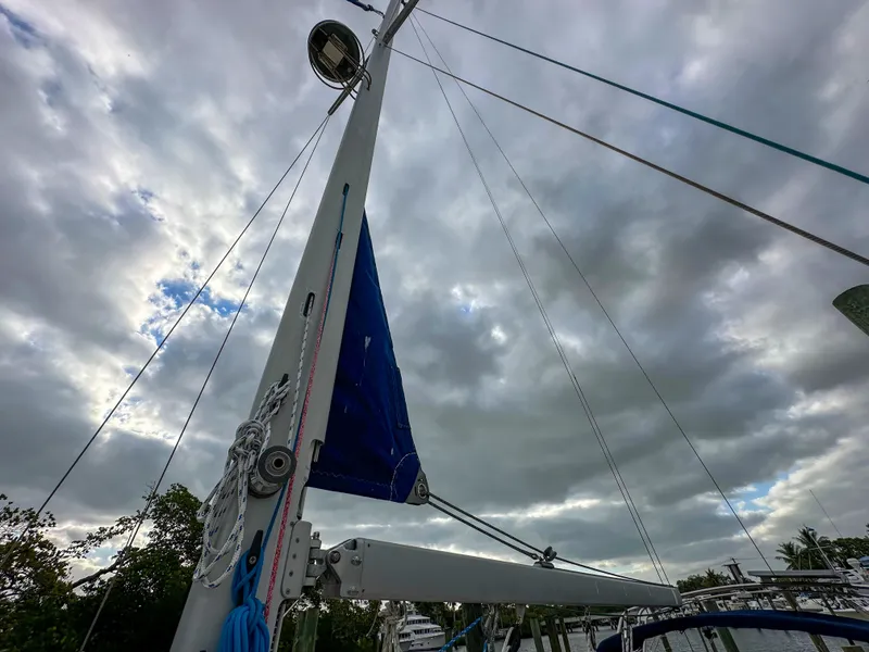 Slide: The Image of Mast of 2005 Island Packet 370 sailboat against cloudy sky. - 6