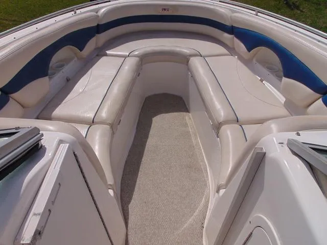 Slide: The Image of 2001 Chaparral 280SSi boat interior with white and blue seating. - 14