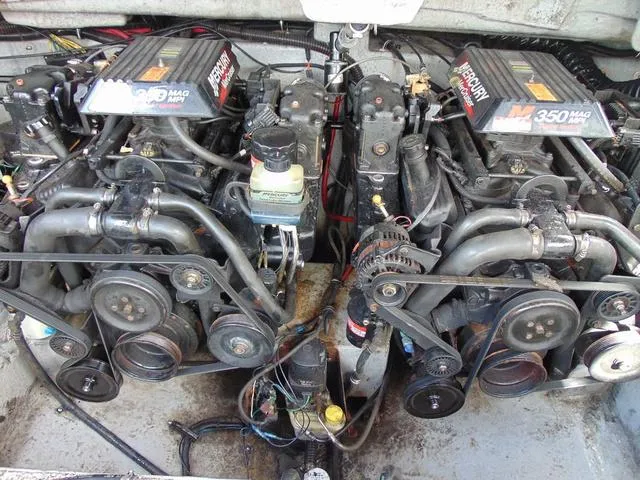 Slide: The Image of Twin MerCruiser 350 MAG engines in a 2001 Chaparral 280SSi boat engine compartment. - 22