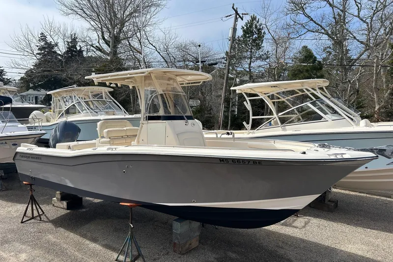 The Image of 2015 Grady-White Fisherman 257 boat with center console and seating, docked outdoors. - 0