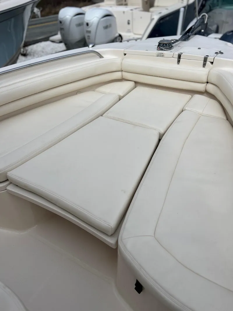 Slide: The Image of 2015 Grady-White Fisherman 257 boat with spacious cushioned seating area. - 19