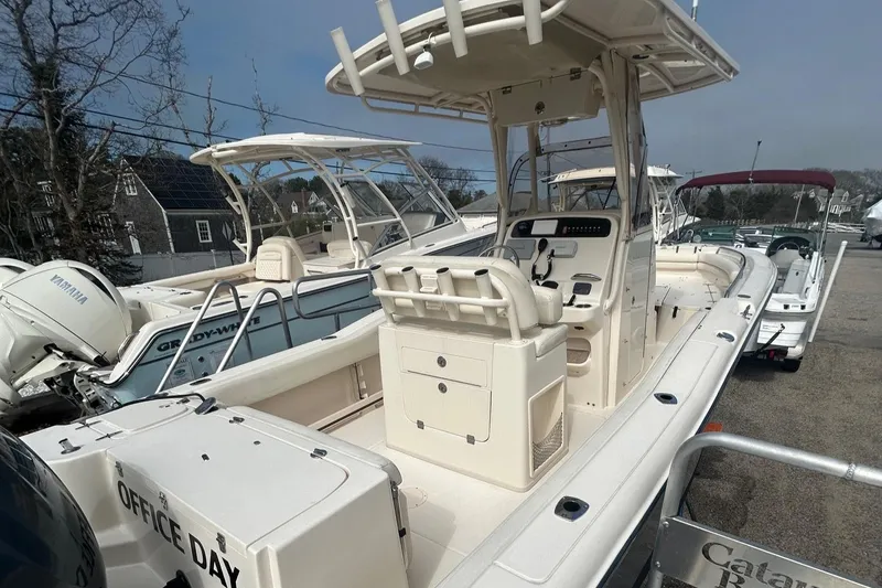 Slide: The Image of 2015 Grady-White Fisherman 257 boat on stands, outdoor storage. - 8