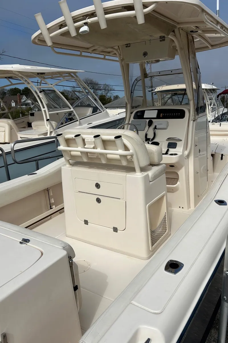 Slide: The Image of 2015 Grady-White Fisherman 257 boat on stands, outdoor display. - 9
