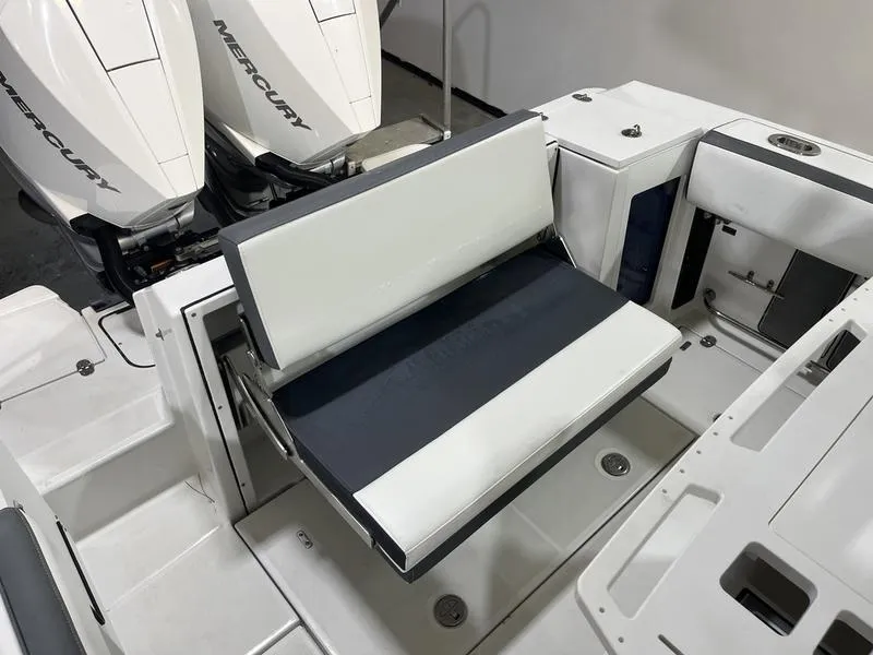 Slide: The Image of 2019 Blackfin 272 CC boat with foldable seating and dual Mercury engines. - 9