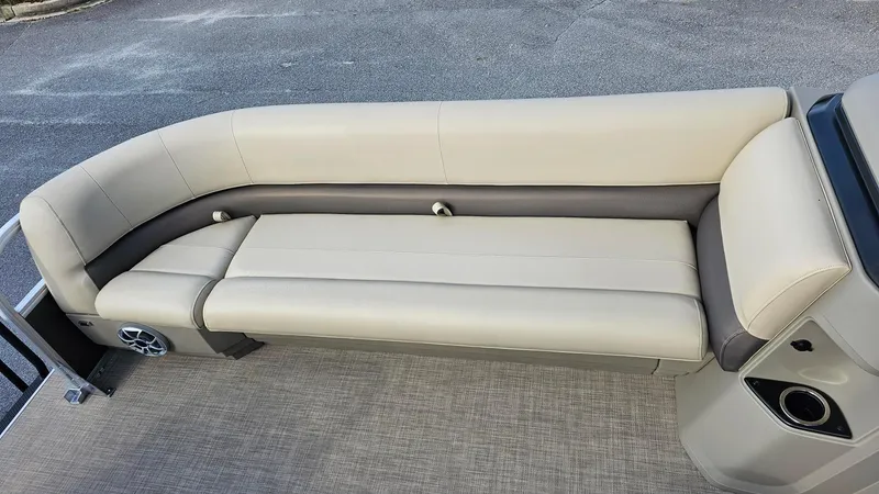 Slide: The Image of 2025 Sun Tracker Party Barge 18 DLX interior seating with beige upholstery. - 10