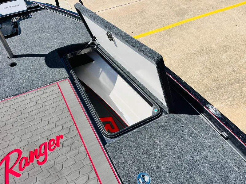 Slide: The Image of 2025 Ranger Z521R Cup-Equipped boat with open storage compartment on deck. - 19