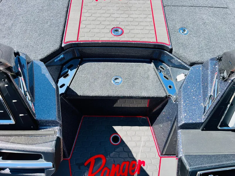 Slide: The Image of 2025 Ranger Z521R Cup-Equipped boat deck with textured flooring and red accents. - 23