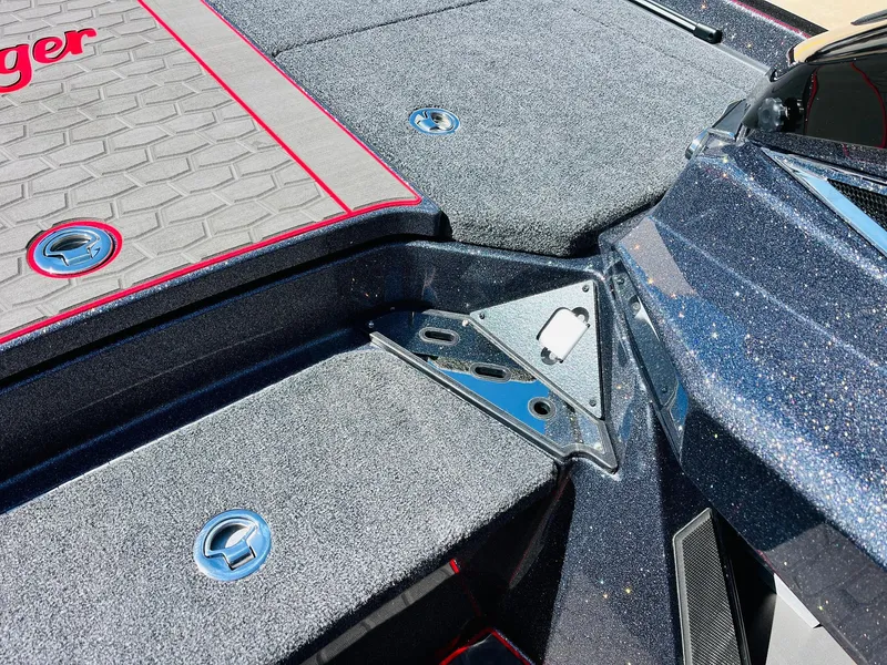 Slide: The Image of 2025 Ranger Z521R Cup-Equipped boat deck with textured surface and storage compartments. - 26