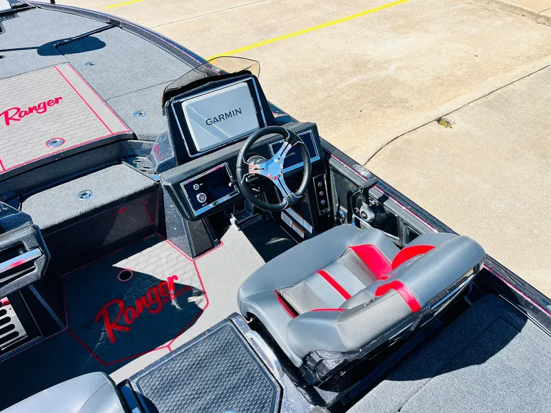 Slide: The Image of 2025 Ranger Z521R Cup-Equipped boat interior with Garmin display and stylish seating. - 36