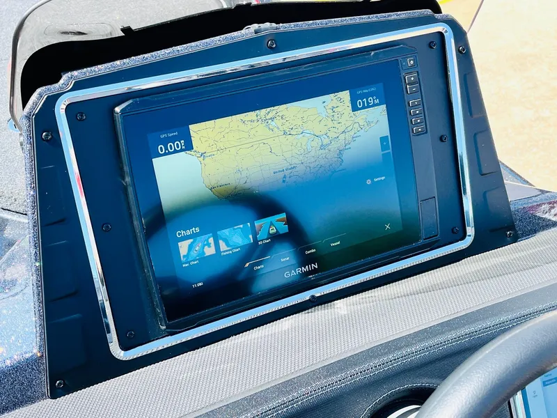 Slide: The Image of 2025 Ranger Z521R Cup-Equipped boat with Garmin navigation display showing map and charts. - 38
