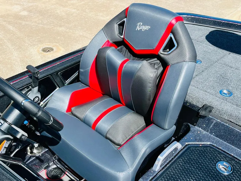 Slide: The Image of 2025 Ranger Z521R Cup-Equipped boat seat, featuring sleek black and red design. - 41
