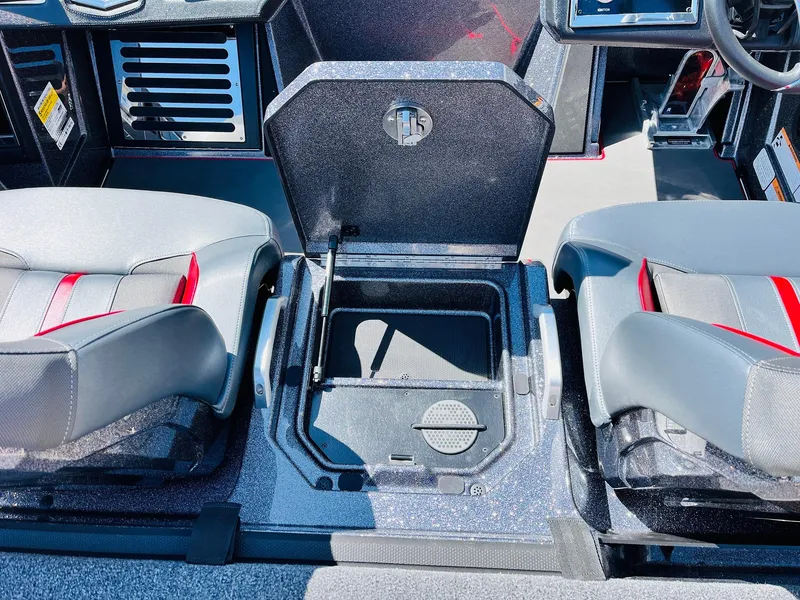 Slide: The Image of 2025 Ranger Z521R Cup-Equipped boat interior with open storage compartment. - 43