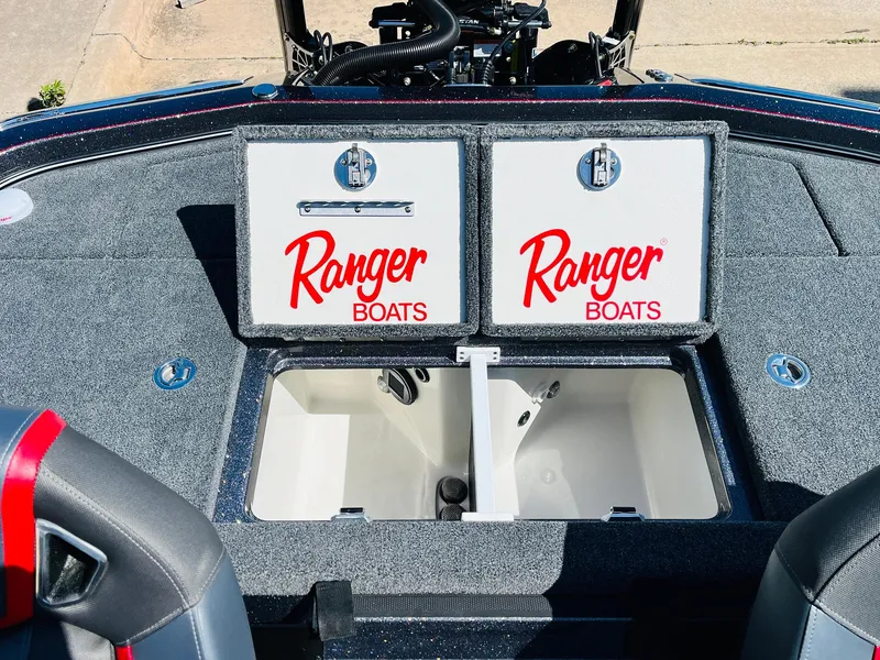 Slide: The Image of 2025 Ranger Z521R Cup-Equipped boat storage compartments with Ranger Boats branding. - 48