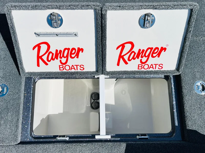 Slide: The Image of 2025 Ranger Z521R Cup-Equipped boat storage compartments with Ranger Boats branding. - 49