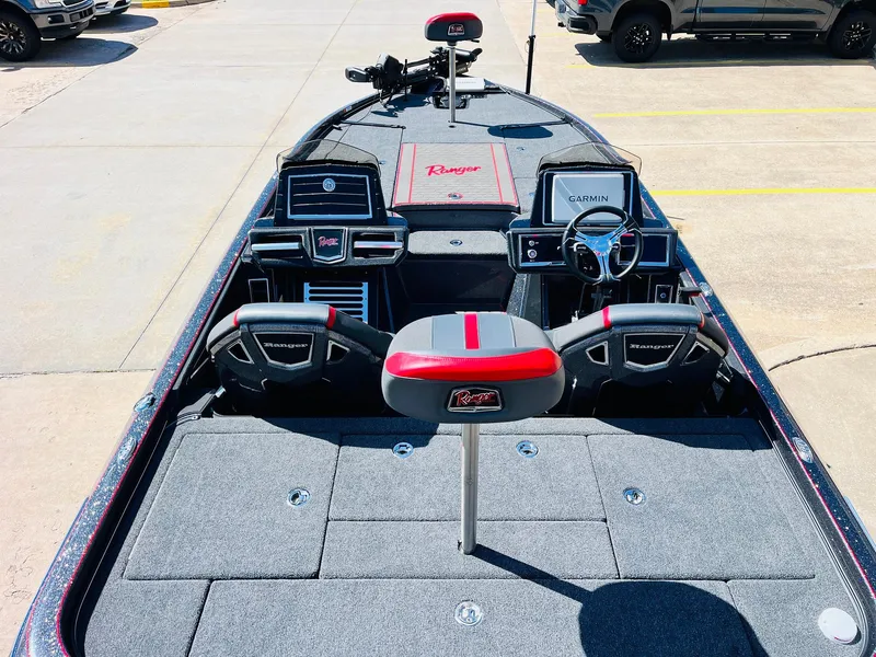 Slide: The Image of 2025 Ranger Z521R Cup-Equipped boat interior with advanced navigation systems and seating. - 8